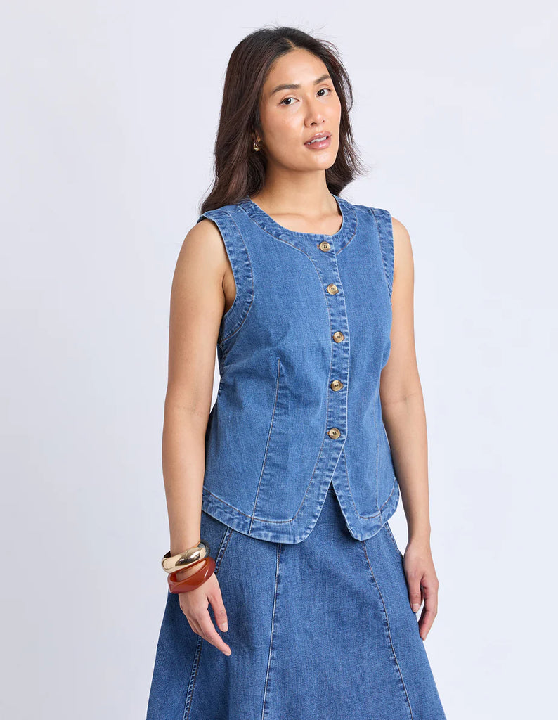Abbott Vest - Mid Blue-Foxwood-An easy layering piece designed with everyday wear in mind. The Abbott Vest combines comfort with a clean, modern silhouette, perfect for styling back with your favourite skirt or pants. Button down front Stretch denim Split hemline at front Our model is 176cm and wears Size 10-Pash + Evolve