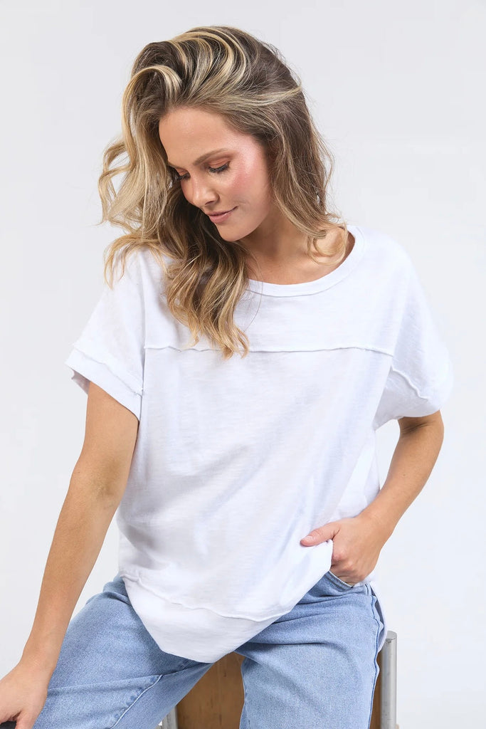 Alison tee - White-Foxwood-Stay vibrant and fresh in the Allison Tee! Made from 100% cotton, this tee will keep you comfortable and stylish all day long whilst adding a pop of colour to your wardrobe. Keep it fun with the Allison Tee! Round neckline Design lines Raw edge details 100% Cotton Our model is 176cm and wears Size 10-Pash + Evolve