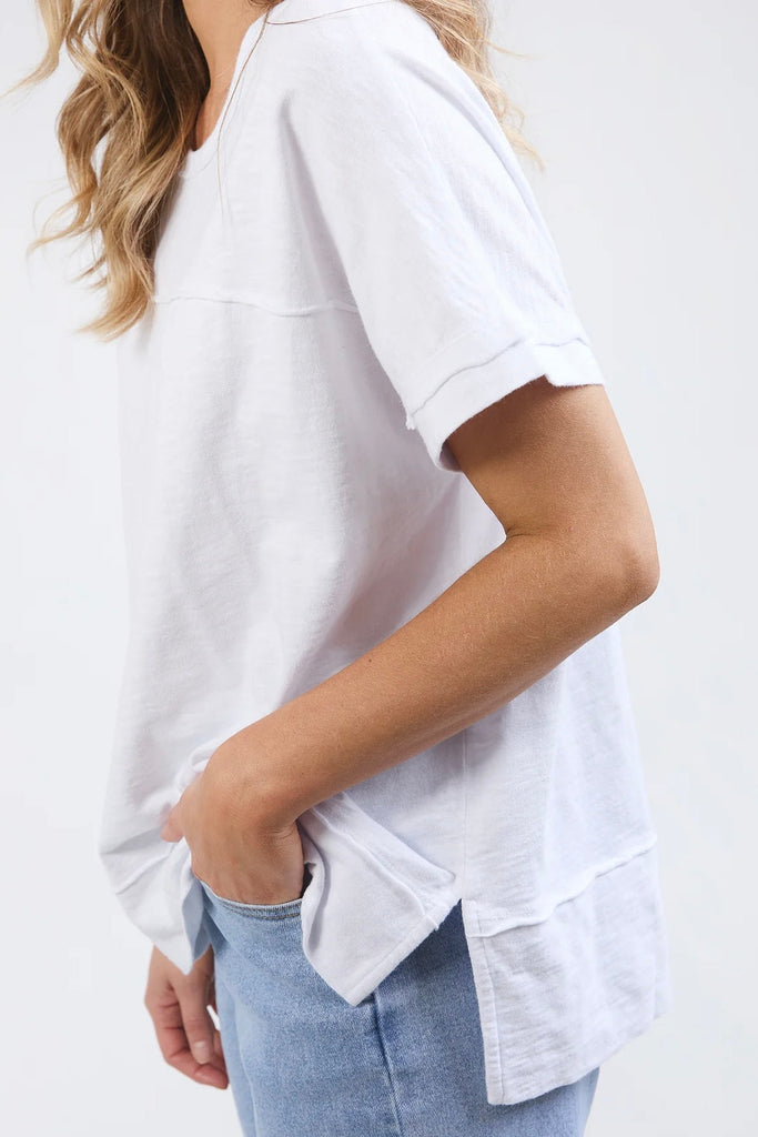 Alison tee - White-Foxwood-Stay vibrant and fresh in the Allison Tee! Made from 100% cotton, this tee will keep you comfortable and stylish all day long whilst adding a pop of colour to your wardrobe. Keep it fun with the Allison Tee! Round neckline Design lines Raw edge details 100% Cotton Our model is 176cm and wears Size 10-Pash + Evolve