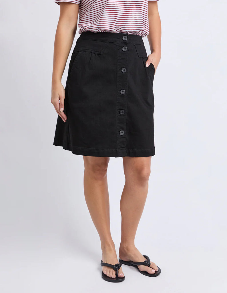 Amanda skirt - Black-Foxwood-A little bit retro. A lot of cute. This A-Line denim button front skirt is a must-have this season. Featuring side pockets, front tuck detail and an elasticated back, this skirt looks great with strappy sandals and your favourite tee! Flat front and elastic back waist Front button opening Side pockets 99% Cotton 1% Elastane Our model is 176cm and wears Size 10-Pash + Evolve