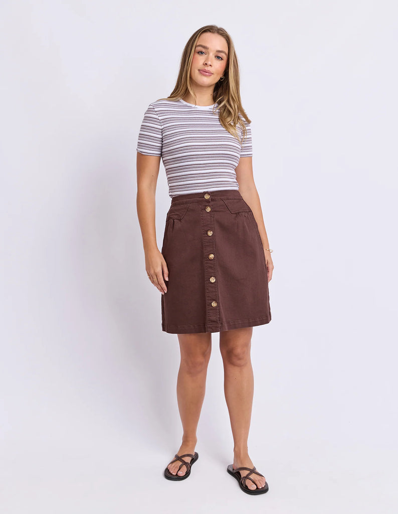 Amanda skirt - chocolate-Foxwood-A little bit retro. A lot of cute. This A-Line denim button front skirt is a must-have this season. Featuring side pockets, front tuck detail and an elasticated back, this skirt looks great with strappy sandals and your favourite tee! Flat front and elastic back waist Front button opening Side pockets 99% Cotton, 1% Elastane Our model is 176cm and wears Size 10-Pash + Evolve