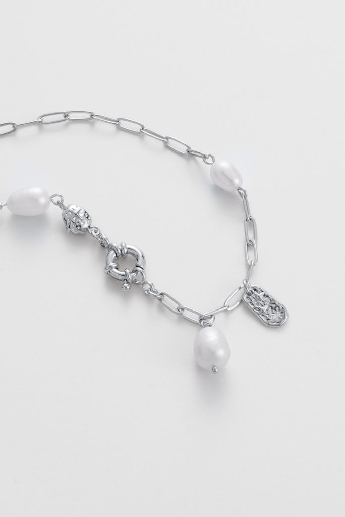 Amara necklace - silver-Zarla-A refined chain necklace detailed with soft pearls and textured accents. Light-catching and layered, it brings a cool, luminous feel with a subtle coastal edge. Feminine, elevated, and designed for everyday wear. *Rhodium Plated Solid Brass Base *Water proof: Can be worn in the ocean or pool-Pash + Evolve