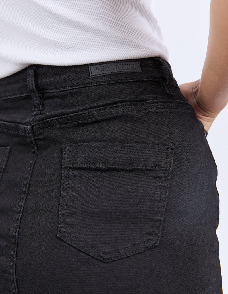 Belle skirt - black-Foxwood-Your new favourite A-line skirt, flaunting a raw edge hem and the relaxed fit of stretch denim, this one will have you sorted for the season. Front button opening Knee length Slim fit Stretch denim 99% Cotton, 1% Elastane Model is wearing a size 10-Pash + Evolve