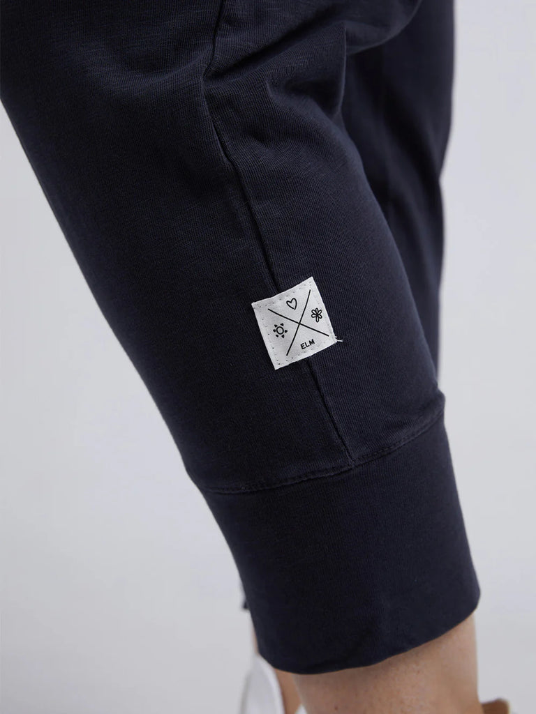 Brunch pant - navy-Elm-Made from 100% cotton slub jersey, Elm’s best-selling Brunch pant provides a relaxed roomy fit that is versatility plus! With a comfy fit elastic waistband paired with an adjustable tie, these cropped length pants feature large cuff detail and will be your go-to straight out of the box! Best selling style Relaxed cropped length fit Elastic waistband with adjustable tie 100% Cotton slub jersey Model is wearing a size 10-Pash + Evolve