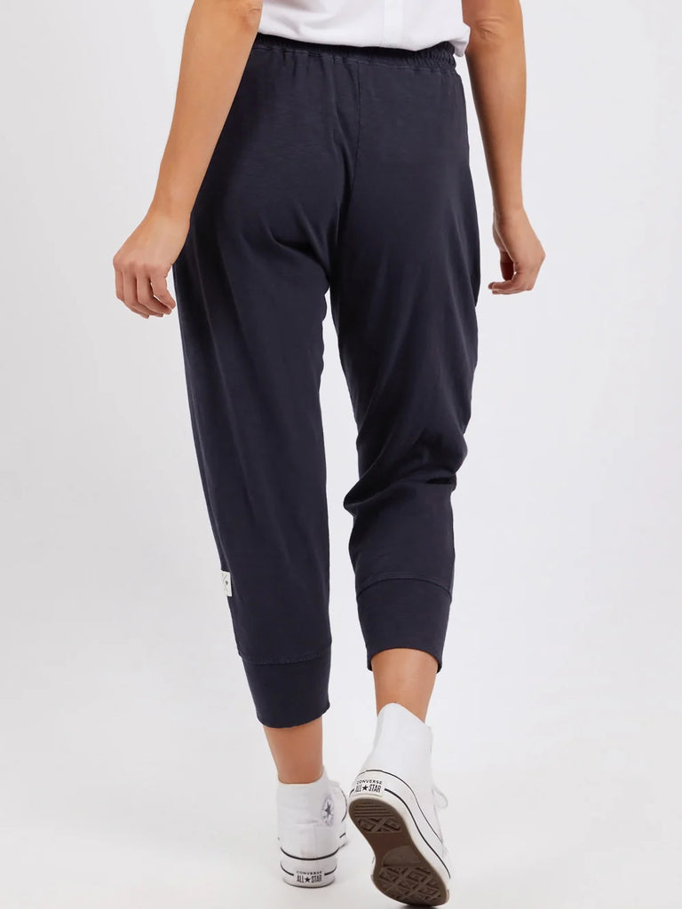 Brunch pant - navy-Elm-Made from 100% cotton slub jersey, Elm’s best-selling Brunch pant provides a relaxed roomy fit that is versatility plus! With a comfy fit elastic waistband paired with an adjustable tie, these cropped length pants feature large cuff detail and will be your go-to straight out of the box! Best selling style Relaxed cropped length fit Elastic waistband with adjustable tie 100% Cotton slub jersey Model is wearing a size 10-Pash + Evolve