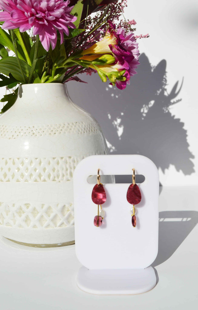 Chloe earrings - merlot-Hagen + Co-An organic shaped earring in marbled, merlot acrylic with charms in amethyst coloured glass faceted beads and freshwater pearl nuggets. Hanging from a gold huggie hoop. These earrings are so delicate and pretty with a contemporary edge. One of our favourites!*Materials: Acrylic, glass beads, freshwater pearls*Nickel Free earring hoops*Light weight and easy to wear.*Hoop: 15mm*Earring: 13mm x 40mmPackaged in a gift box-Pash + Evolve