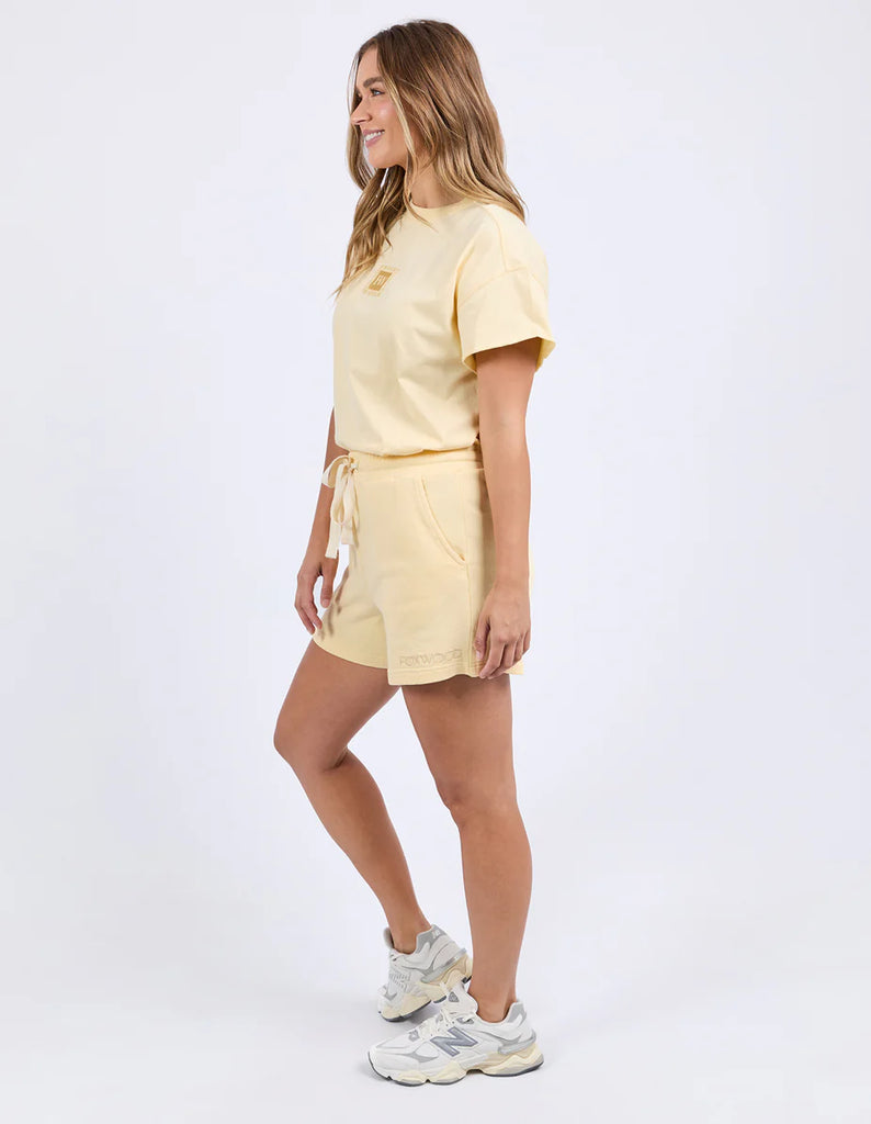 Classic Short - Lemon-Foxwood-Butter soft and simply the perfect pair of shorts to match back with your out-and-about leisure wear. The new Classic Short from Foxwood Clothing are exactly that. A classic short featuring drawstring cord, side pockets and a lovely vintage washed rinse. Elastic waist Front leg embroidery Side pockets 100% Cotton Model is wearing a size 10-Pash + Evolve