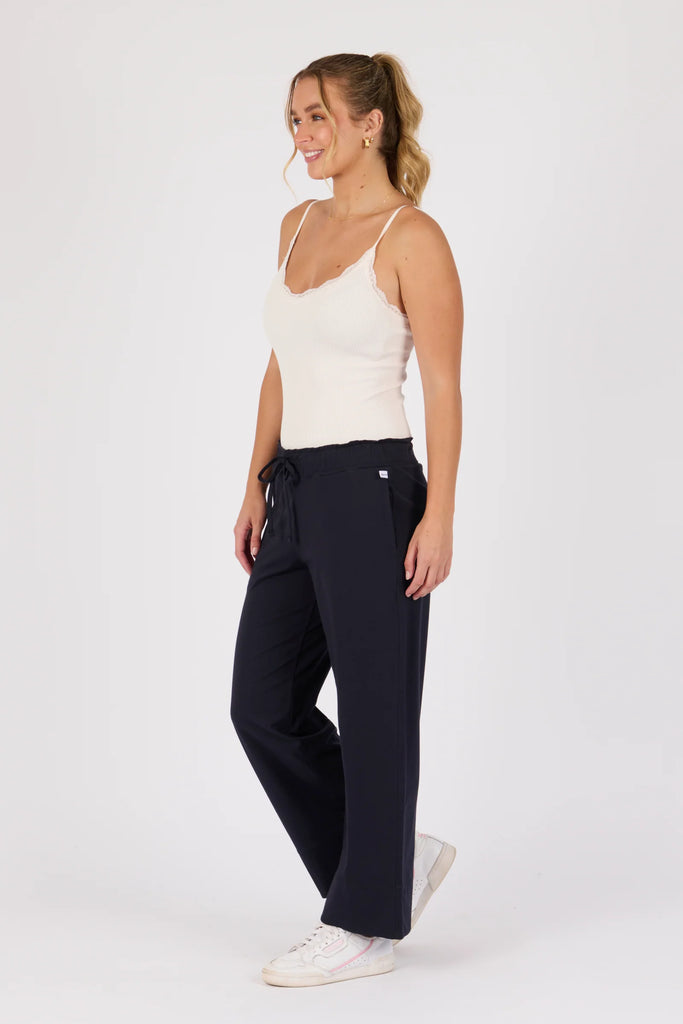 Cuff Detail Pant - Blue Graphite-One Ten Willow-Elasticated Waist Band Self Fabric Waist Tie Side Pockets Wide Leg Cuff Detail Material: 95% Cotton 5% Elastane Model is 176cm (Size 8-10) and wears our size Small-Pash + Evolve