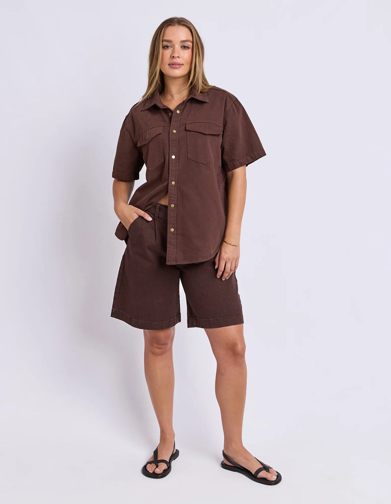 Daisy Short Sleeve Shirt - Chocolate-Foxwood-Your favourite denim shirt just got cooler with short sleeves. Featuring a button-through placket, front chest pockets, and a relaxed fit, the Daisy SS Shirt is perfect for easygoing days with laid-back style. Button through placket Front chest pockets Relaxed fit Model is wearing a size 10-Pash + Evolve