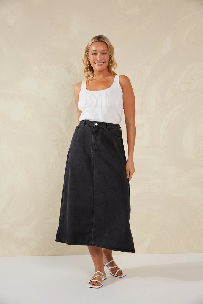 Dalton Denim Skirt - Slate-HAVEN-Meet your new go-to denim piece, the Dalton Denim Skirt, crafted from stretchy cotton. This midi skirt, flaunting an A-line silhouette, seamlessly incorporates features from your favourite denim jeans. An ideal alternative to traditional jeans, it's the perfect companion for casual occasions and weekend activities. A-Line Mid-rise Half elastic waist Button and zip closure Belt loops Front and back pockets Wide vents Midi-length 98% Cotton, 2% Spandex-Pash + Evolve