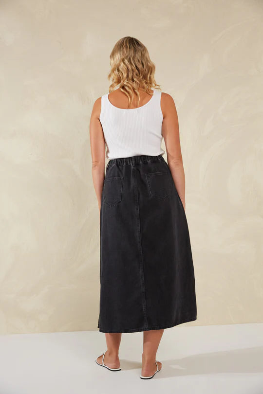 Dalton Denim Skirt - Slate-HAVEN-Meet your new go-to denim piece, the Dalton Denim Skirt, crafted from stretchy cotton. This midi skirt, flaunting an A-line silhouette, seamlessly incorporates features from your favourite denim jeans. An ideal alternative to traditional jeans, it's the perfect companion for casual occasions and weekend activities. A-Line Mid-rise Half elastic waist Button and zip closure Belt loops Front and back pockets Wide vents Midi-length 98% Cotton, 2% Spandex-Pash + Evolve