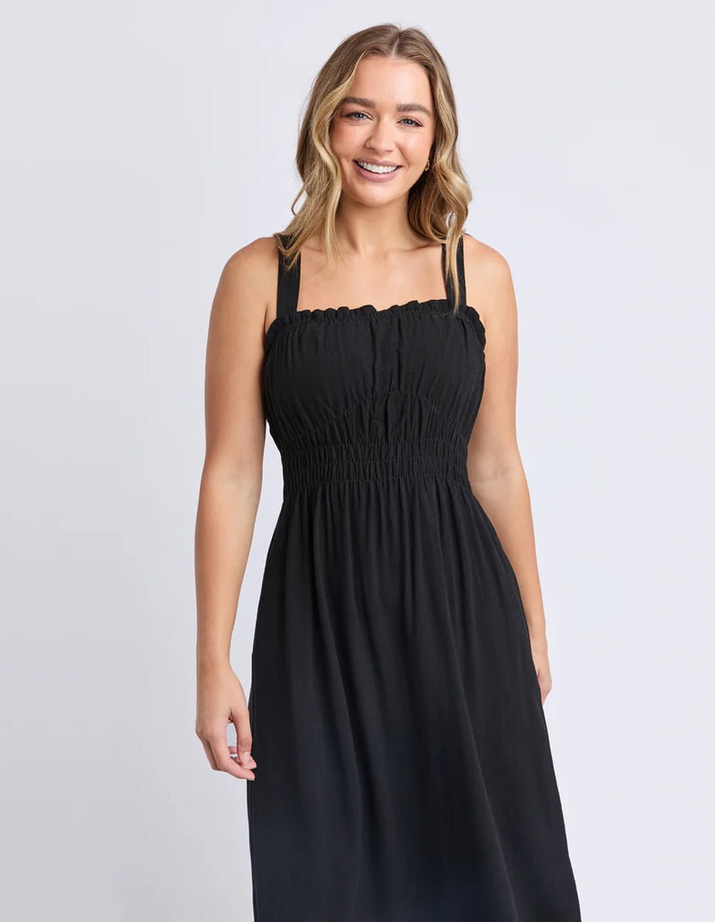 Dandelion dress - black-Foxwood-Say hello to sunshine days with the Dandelion Dress. The shirred bodice gives a flattering fit, the midi skirt swishes as you move, and the wide straps keep it comfy. Finished with handy side pockets, it’s a dress made for twirling through summer. Shaped elastic waist Side pockets Adjustable straps 70% Viscose 30% Linen Our model is 176cm and wears Size 10-Pash + Evolve