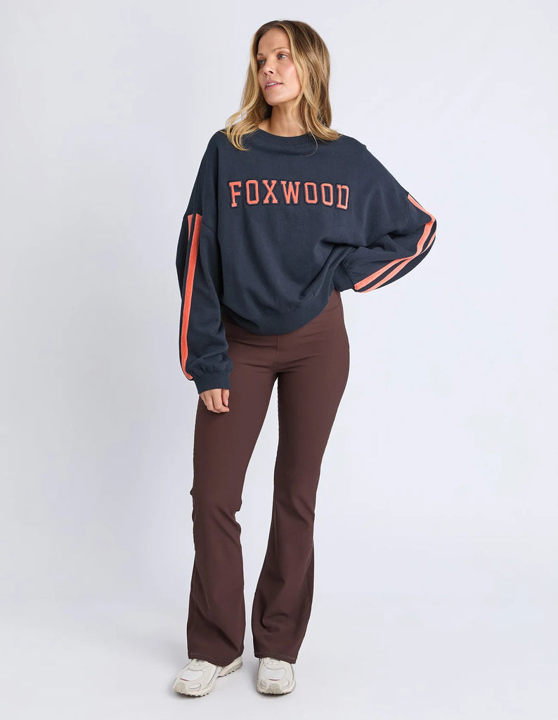 Elevated Sunday Crew - Navy/orange-Foxwood-Designed for off-duty comfort with a polished edge, the Elevated Sunday Crew brings something a little extra to your everyday layers. Featuring velour artwork across the chest and sleeves, it adds texture and depth while still keeping things understated. The soft round neckline and relaxed, boxy fit make it easy to wear, while the luxe detailing gives it a more considered feel. Front chest and sleeve velour artwork Round neckline Relaxed boxy fit 100% Cotton Our m