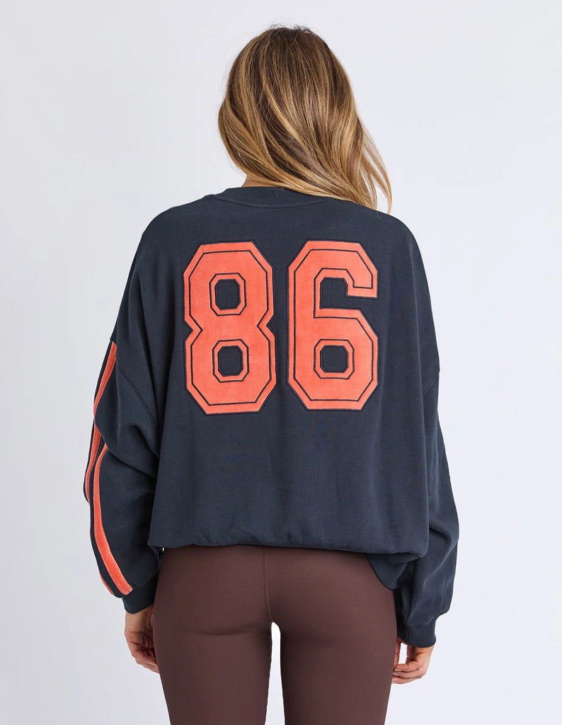 Elevated Sunday Crew - Navy/orange-Foxwood-Designed for off-duty comfort with a polished edge, the Elevated Sunday Crew brings something a little extra to your everyday layers. Featuring velour artwork across the chest and sleeves, it adds texture and depth while still keeping things understated. The soft round neckline and relaxed, boxy fit make it easy to wear, while the luxe detailing gives it a more considered feel. Front chest and sleeve velour artwork Round neckline Relaxed boxy fit 100% Cotton Our m