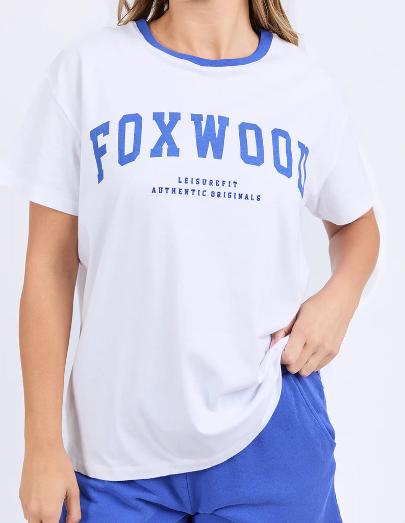 Elude Tee - White-Foxwood-Old-school cool with a fresh twist. The Elude Tee features an exclusive collegiate-style print, contrast neckband, and an oversized fit for that true retro feel. Part of our Leisurefit range, it’s made for keeping things relaxed and bold. Foxwood exclusive front chest print Contrast neckband Oversized fit 100% Cotton Model is wearing a size 10-Pash + Evolve