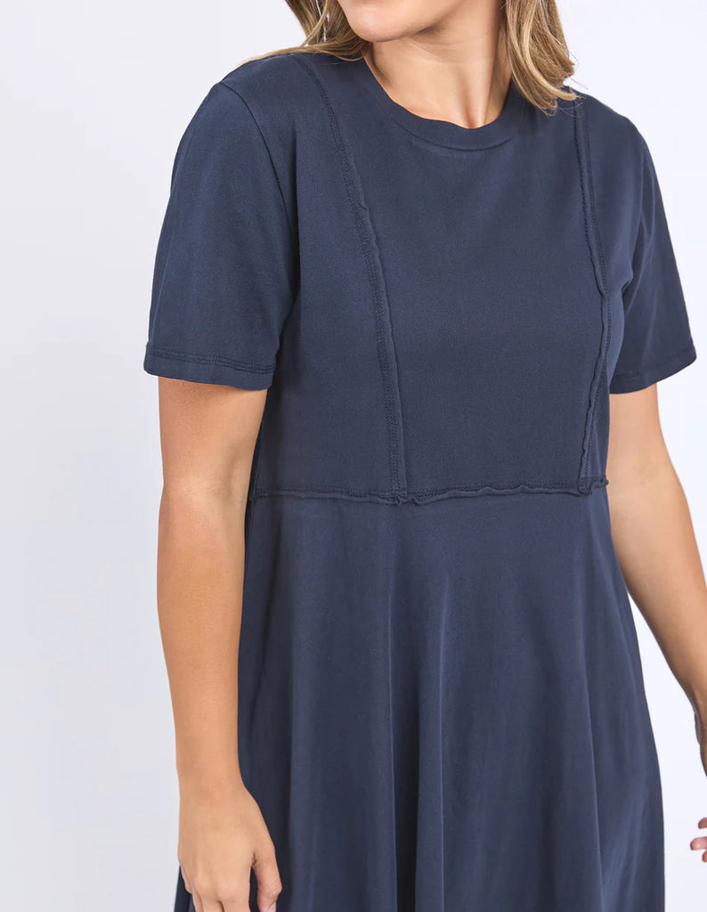 Eva Dress - Navy-Foxwood-The Eva Dress is your new everyday favourite. This cute shift dress features a flattering neckline and a breezy knee length. Made from crisp 100% cotton poplin, it’s fresh, fun, and perfect for all-day, every day wear. Round neckline Knee length Raw edge details 100% Cotton Model is wearing a size 10-Pash + Evolve