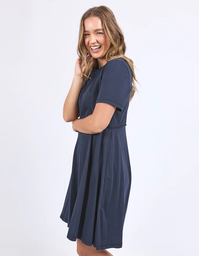 Eva Dress - Navy-Foxwood-The Eva Dress is your new everyday favourite. This cute shift dress features a flattering neckline and a breezy knee length. Made from crisp 100% cotton poplin, it’s fresh, fun, and perfect for all-day, every day wear. Round neckline Knee length Raw edge details 100% Cotton Model is wearing a size 10-Pash + Evolve