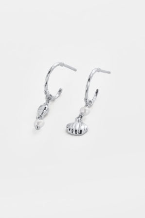Goldie hoop - silver-Zarla-A refined hoop finished with delicate charms and soft pearl accents. Light-catching and fluid, it brings a cool, luminous feel with a subtle coastal edge. Effortless, feminine, and designed for everyday wear. *Rhodium Plated Solid Brass Base *Water proof: Can be worn in the ocean or pool-Pash + Evolve