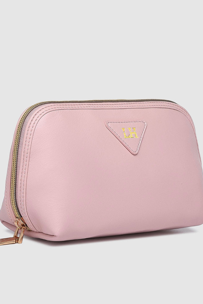 Greta Makeup Bag - Baby Pink-Louenhide-The Louenhide Greta Baby Pink Makeup Bag will take your beauty routine to the next level! As pretty as it is practical, choose your favourite shade and let your personality shine through. Crafted from a lightweight and soft to touch material, this travel makeup pouch is easy to carry and perfect for tossing into your carry-on or beach bag. Featuring a small open compartment that's the right size for your essentials, this women's toiletry bag ensures you find exactly wh