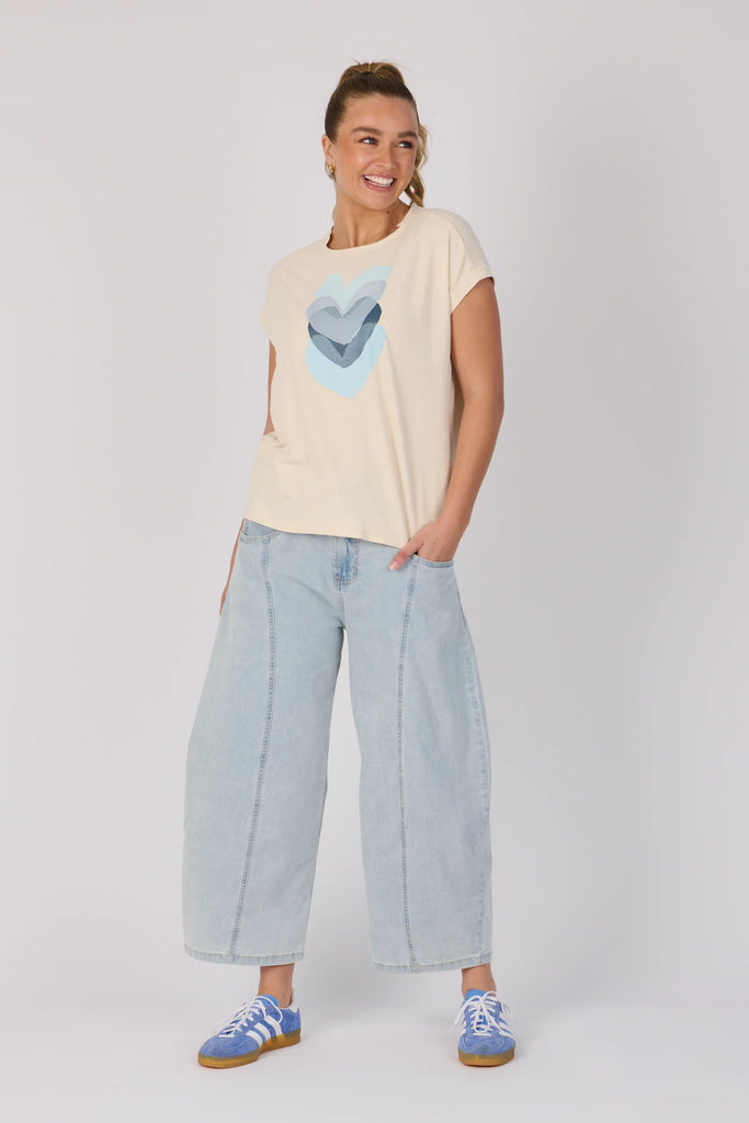 Half Collar Tee - Ecru Falling Hearts-One Ten Willow-The Half Collar Tee in Ecru Falling Hearts is crafted from a soft cotton blend for easy everyday wear. Featuring a relaxed fit with a round neckline, short sleeves, and a half-collar detail for a modern touch, this tee combines casual comfort with subtle style. Fabric: 80% COTTON, 15% POLYESTER, 5% ELASTANE – soft with a gentle stretch Fit: Relaxed fit. Our model is 176cm tall (size 8–10) and wears a size small. Designed in Geelong, Victoria-Pash + Evolve