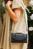 Harlow Crossbody Bag - Black-Louenhide-The Louenhide Harlow Black Crossbody Bag is a timeless, year-round wardrobe staple featuring a subtle woven vegan leather trim. Whether you are heading to brunch or afternoon drinks, the detachable and adjustable crossbody strap allows you to seamlessly transition the Harlow Black from crossbody to clutch. With the two thoughtfully designed compartments and large zip pocket, organise your daily essentials with ease. Available in a range of neutral colourways and design
