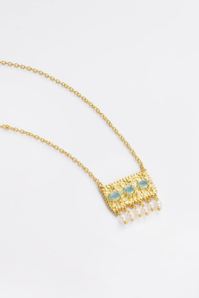 Imogen Necklace - milky aqua-Zarla-A delicate chain finished with an intricate pendant, set with soft aqua tones and fine detailing. Light-catching and layered, it brings a subtle, ocean-inspired feel with a refined edge. Designed to elevate your look with effortless ease. *18K Gold Plated Solid Brass Base *41cm + 5cm Extender *This piece is handmade and not recommended to be worn in water-Pash + Evolve