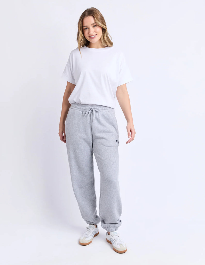 Intention trackpant - grey marle/navy-Foxwood-Your off-duty uniform just got an upgrade. The Intention Trackpant pairs a relaxed fit with soft cotton comfort, finished with a drawcord waist and elastic cuffs for that easy, pulled-together feel. The Foxwood side leg print adds a sporty edge, making them perfect for everything from slow mornings to weekend errands. Foxwood exclusive side leg artwork Elastic waist with drawcord Elastic cuff 100% Cotton Our model is 176cm and wears Size 10-Pash + Evolve