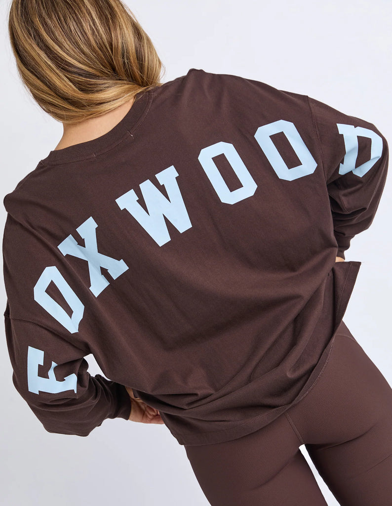 Interval Long Sleeve - Coffee/Light Blue-Foxwood-The Interval Long Sleeve is your go-to everyday essential, inspired by our best-selling Interval range. Designed in a relaxed fit, it’s made from soft, breathable cotton for all-day comfort. Featuring a bold front chest print with a large back print, it delivers an effortless sporty look. Perfect for layering or wearing on its own, it’s an easy staple for any off-duty wardrobe. 100% Cotton Front chest print Large back and sleeve print Relaxed fit Model is we