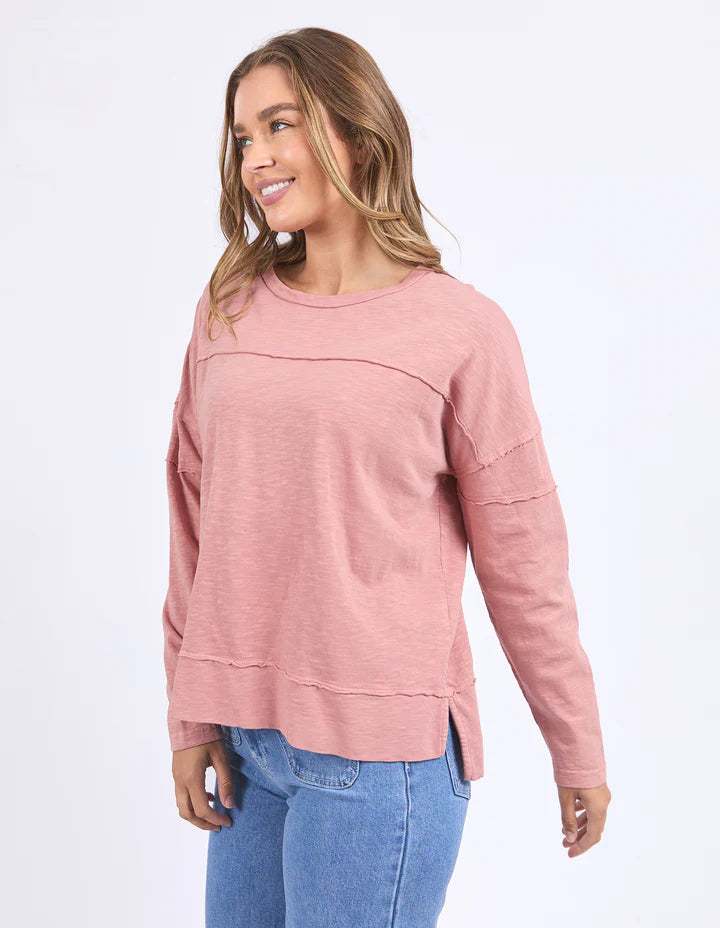 Jayne Throw On Top - Ash Rose-Foxwood-The Jayne Throw on Top is the perfect lightweight long sleeve to take you through the seasons. Cut from a comfy, cotton slub jersey this women's top features a crew neck, trendy exposed stitching and side split hi-low hem. Seriously versatile we know you'll be wearing this on repeat. Round neckline Design lines Raw edge details 100% Cotton Model is wearing a size 10-Pash + Evolve
