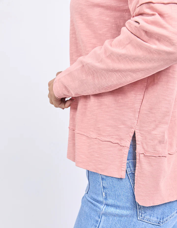 Jayne Throw On Top - Ash Rose-Foxwood-The Jayne Throw on Top is the perfect lightweight long sleeve to take you through the seasons. Cut from a comfy, cotton slub jersey this women's top features a crew neck, trendy exposed stitching and side split hi-low hem. Seriously versatile we know you'll be wearing this on repeat. Round neckline Design lines Raw edge details 100% Cotton Model is wearing a size 10-Pash + Evolve