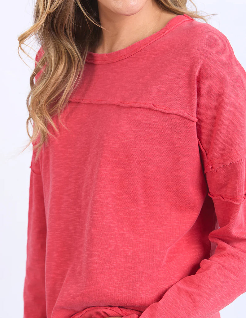 Jayne Throw On Top - Cayenne Red-Foxwood-The Jayne Throw on Top is the perfect lightweight long sleeve to take you through the seasons. Cut from a comfy, cotton slub jersey this women's top features a crew neck, trendy exposed stitching and side split hi-low hem. Seriously versatile we know you'll be wearing this on repeat. Round neckline Design lines Raw edge details 100% Cotton Our model is 176cm and wears Size 10-Pash + Evolve