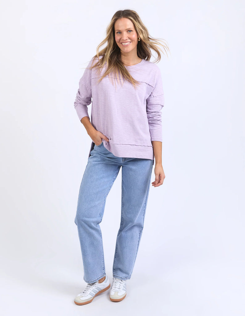 Jayne Throw On Top - Orchid Bloom-Foxwood-The Jayne Throw on Top is the perfect lightweight long sleeve to take you through the seasons. Cut from a comfy, cotton slub jersey this women's top features a crew neck, trendy exposed stitching and side split hi-low hem. Seriously versatile we know you'll be wearing this on repeat. Round neckline Design lines Raw edge details 100% Cotton Our model is 176cm and wears Size 10-Pash + Evolve