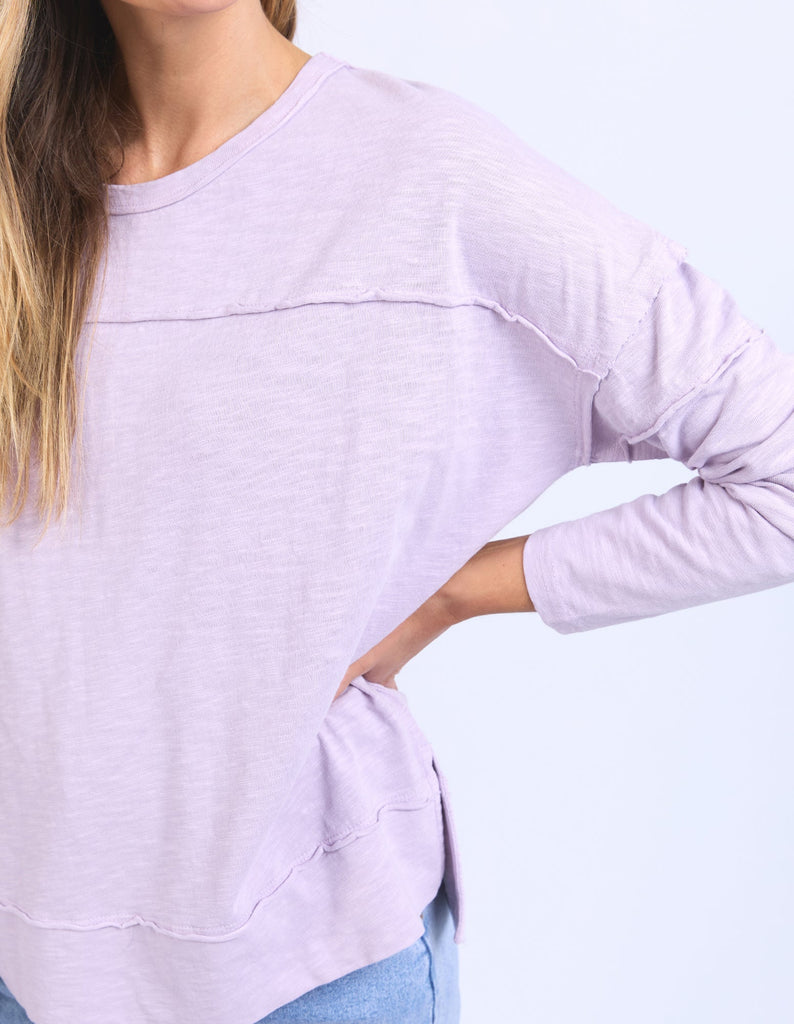 Jayne Throw On Top - Orchid Bloom-Foxwood-The Jayne Throw on Top is the perfect lightweight long sleeve to take you through the seasons. Cut from a comfy, cotton slub jersey this women's top features a crew neck, trendy exposed stitching and side split hi-low hem. Seriously versatile we know you'll be wearing this on repeat. Round neckline Design lines Raw edge details 100% Cotton Our model is 176cm and wears Size 10-Pash + Evolve