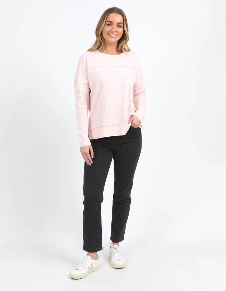 Jayne Throw On Top - Pale Pink-Foxwood-The Jayne Throw on Top is the perfect lightweight long sleeve to take you through the seasons. Cut from a comfy, cotton slub jersey this women's top features a crew neck, trendy exposed stitching and side split hi-low hem. Seriously versatile we know you'll be wearing this on repeat. Round neckline Design lines Raw edge details 100% Cotton Our model is 176cm and wears Size 10-Pash + Evolve