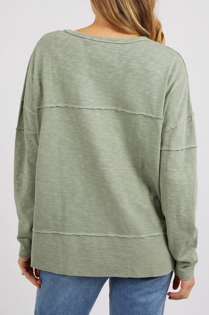 Jayne Throw On Top - Sage-Foxwood-The Jayne Throw on Top is the perfect lightweight long sleeve to take you through the seasons. Cut from a comfy, cotton slub jersey this women's top features a crew neck, trendy exposed stitching and side split hi-low hem. Seriously versatile we know you'll be wearing this on repeat. 100% COTTON JERSEY Designed in Australia-Pash + Evolve