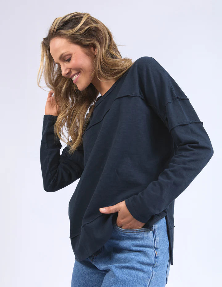 Jayne throw on top - navy-Foxwood-The Jayne Throw on Top is the perfect lightweight long sleeve to take you through the seasons. Cut from a comfy, cotton slub jersey this women's top features a crew neck, trendy exposed stitching and side split hi-low hem. Seriously versatile we know you'll be wearing this on repeat. Round neckline Design lines Raw edge details 100% Cotton Our model is 176cm and wears Size 10-Pash + Evolve