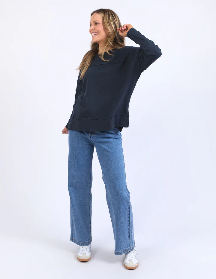 Jayne throw on top - navy-Foxwood-The Jayne Throw on Top is the perfect lightweight long sleeve to take you through the seasons. Cut from a comfy, cotton slub jersey this women's top features a crew neck, trendy exposed stitching and side split hi-low hem. Seriously versatile we know you'll be wearing this on repeat. Round neckline Design lines Raw edge details 100% Cotton Our model is 176cm and wears Size 10-Pash + Evolve