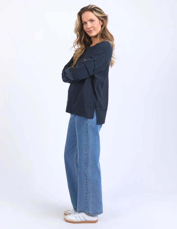 Jayne throw on top - navy-Foxwood-The Jayne Throw on Top is the perfect lightweight long sleeve to take you through the seasons. Cut from a comfy, cotton slub jersey this women's top features a crew neck, trendy exposed stitching and side split hi-low hem. Seriously versatile we know you'll be wearing this on repeat. Round neckline Design lines Raw edge details 100% Cotton Our model is 176cm and wears Size 10-Pash + Evolve