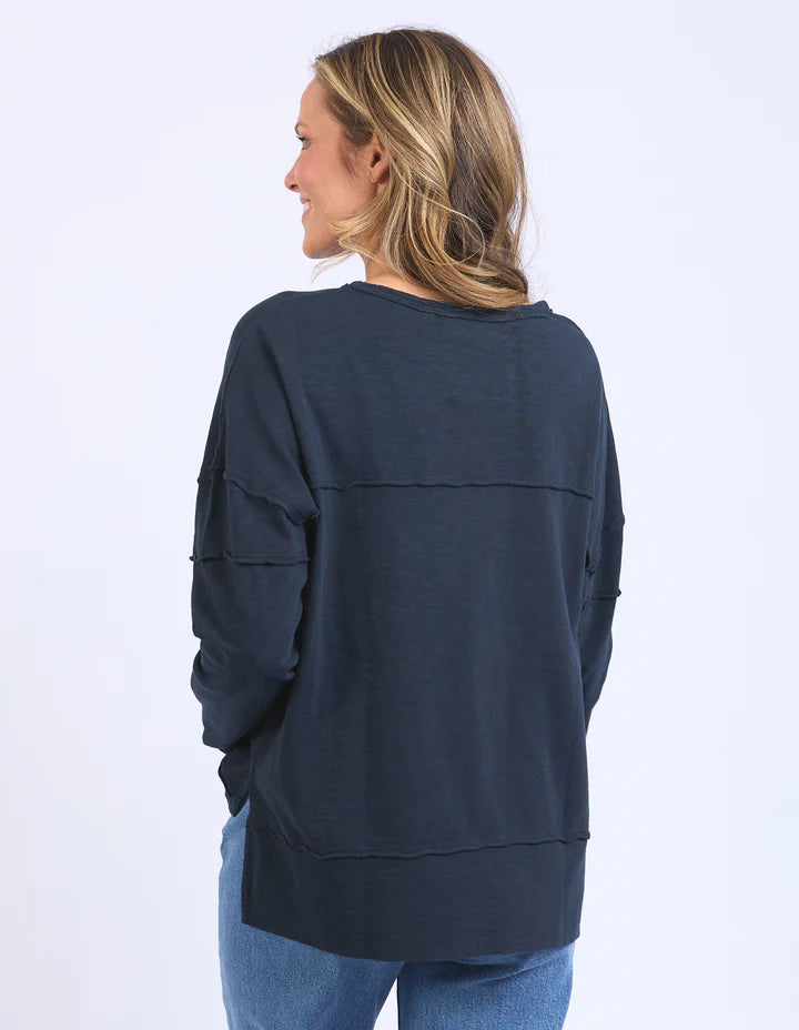Jayne throw on top - navy-Foxwood-The Jayne Throw on Top is the perfect lightweight long sleeve to take you through the seasons. Cut from a comfy, cotton slub jersey this women's top features a crew neck, trendy exposed stitching and side split hi-low hem. Seriously versatile we know you'll be wearing this on repeat. Round neckline Design lines Raw edge details 100% Cotton Our model is 176cm and wears Size 10-Pash + Evolve