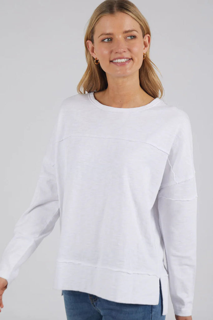 Jayne throw on top - white-Foxwood-The Jayne Throw on Top is the perfect lightweight long sleeve to take you through the seasons. Cut from a comfy, cotton slub jersey this women's top features a crew neck, trendy exposed stitching and side split hi-low hem. Seriously versatile we know you'll be wearing this on repeat. 100% COTTON JERSEY Designed in Australia-Pash + Evolve