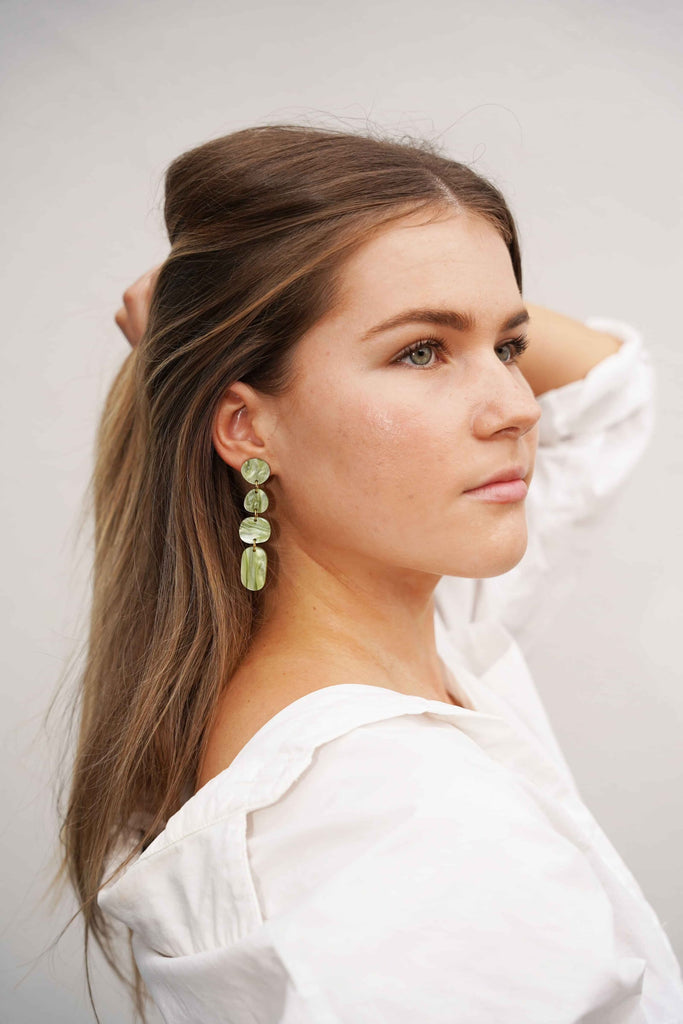 Juno earrings - sage-Hagen + Co-A contemporary earring with drops of organic shapes in a beautiful sage green coloured marble acrylic. So sleek and timeless. *Materials: Acrylic*Nickel Free earring posts *Light weight and easy to wear. *Earring: 16mm x 65mm *Packaged in a gift box-Pash + Evolve