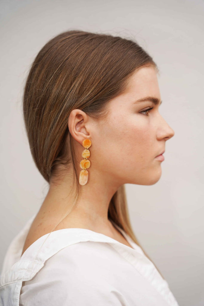 Juno earrings - sunset-Hagen + Co-A contemporary earring with drops of organic shapes in a beautiful sunset amber coloured marble acrylic. So sleek and timeless. *Materials: Acrylic*Nickel Free earring posts *Light weight and easy to wear. *Earring: 16mm x 65mm *Packaged in a gift box-Pash + Evolve