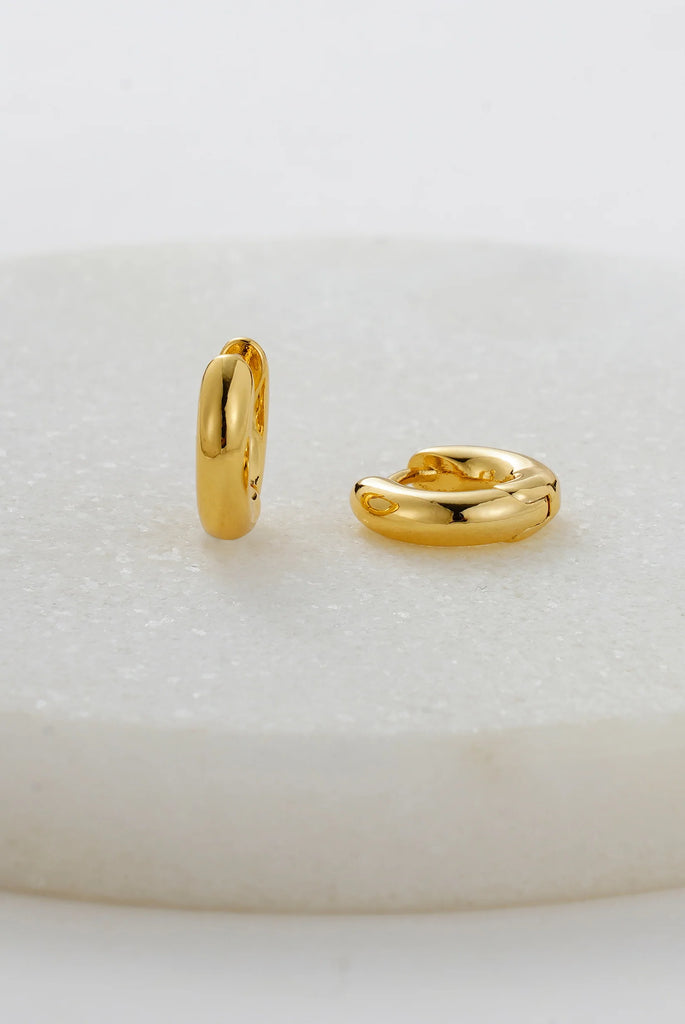 Kendall huggie - gold-Zafino-A timeless essential, the Kendall Huggie features a sleek, polished gold finish with a softly rounded silhouette. Designed for everyday wear, this classic piece adds effortless sophistication to any ear stack – perfect on its own or layered with your favourite hoops. Metal: 18K Gold Plated on BrassDimensions: 8mm HoopWater Resistant: Splash proof, not recommended to be worn in the ocean or pool Water resistant Hypoallergenic & Nickel Free Female Founded & Family Owned-Pash + Evo