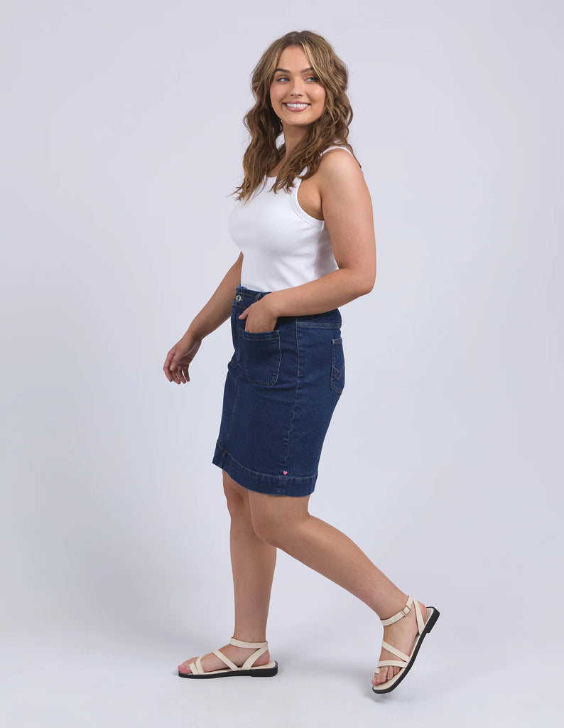 Lennox Denim Skirt - Dark Blue Wash-Elm-Redefine comfort and chic with the Lennox Denim Skirt, featuring the comfort of an elastic waistband and the style of patch pockets this is an easy wear stylish denim skirt. Elastic around side seams and back waist Self fabric front patch pockets Elm stamped hardware Stretch Denim Model is 171cm and wears Size 10-Pash + Evolve