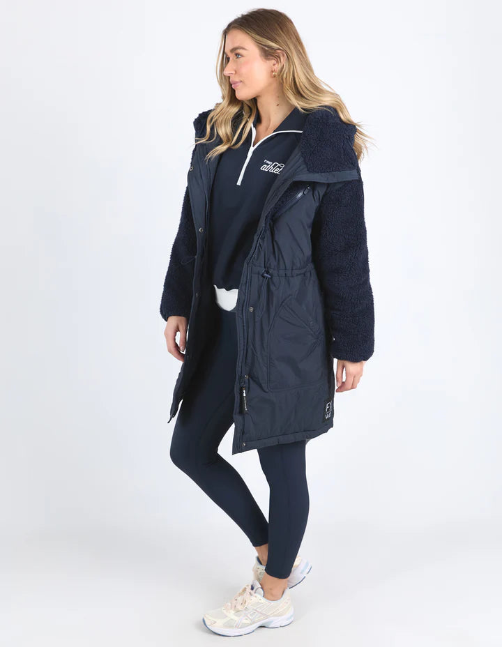 Longline Anorak - Navy-Foxwood-Be sure to stay snuggly warm on those cold days in the LeisureFit Longline Anorak. Featuring a zip and button opening for extra warmth, along with an elastic waist for flattering comfort this is the only layer you'll need this season. Front zip and button opening Contrast teddy fleece panels Elastic waist 100% Nylon Lining: 100% Polyester Model is wearing a size 10-Pash + Evolve