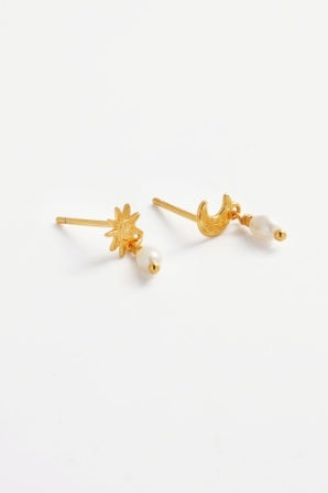 Luna pearl drop - gold-Zarla-A playful drop earring featuring mismatched sun and moon details, finished with a soft pearl. Light-catching and expressive, it brings a warm, sunlit feel with a subtle celestial edge. Effortless, feminine, and designed to stand out. *18K Gold Plated Solid Brass Base *Water proof: Can be worn in the ocean or pool-Pash + Evolve