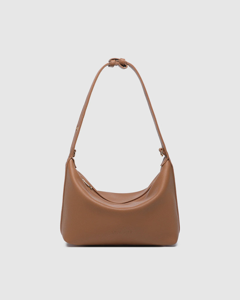 Madeline Shoulder Bag - Toffee-Louenhide-The Madeline Toffee Shoulder Bag is a softly structured staple designed for days that move between moments. Blending relaxed structure with a smooth, polished finish, her silhouette brings a quiet confidence to your everyday styling. As a vegan leather shoulder bag, Madeline Toffee pairs effortlessly with everything from tailored workwear to relaxed denim and evening silhouettes, making her a considered addition to any wardrobe. Internal Features Zip Pocket, 2 Slip
