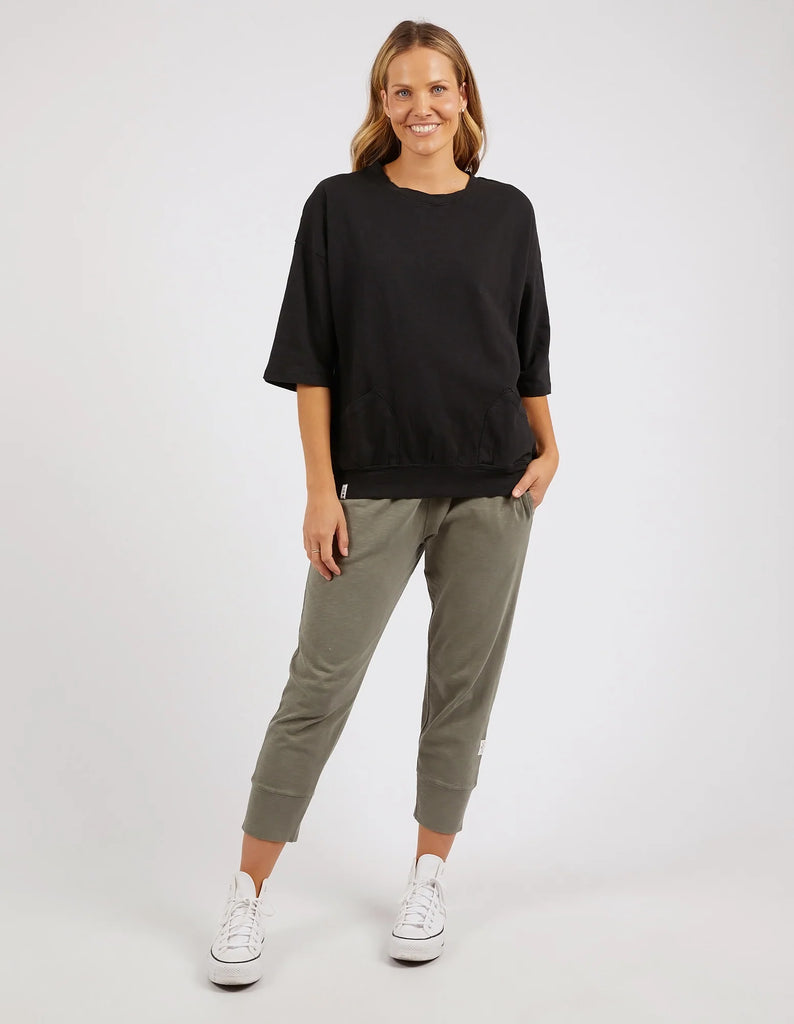 Mazie Sweat - Black-Elm-The Mazie Sweat is the ideal blend of style and versatility. This oversized fit and 3/4 length sleeves allow plenty of room for movement. Made with a gorgeous lightweight Cotton fabric to make it ideal for layering. Best selling style Relaxed fit 3/4 length sleeves 100% Cotton Model is wearing a size 10.-Pash + Evolve