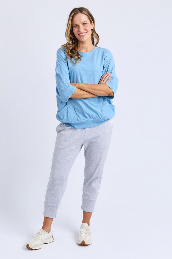 Mazie Sweat - Dusk Blue-Elm-The Mazie Sweat is the ideal blend of style and versatility. This oversized fit and 3/4 length sleeves allow plenty of room for movement. Made with a gorgeous lightweight Cotton fabric to make it ideal for layering. Best selling style Relaxed fit 3/4 length sleeves Pockets at the waistband 100% Cotton Model is wearing a size 10-Pash + Evolve