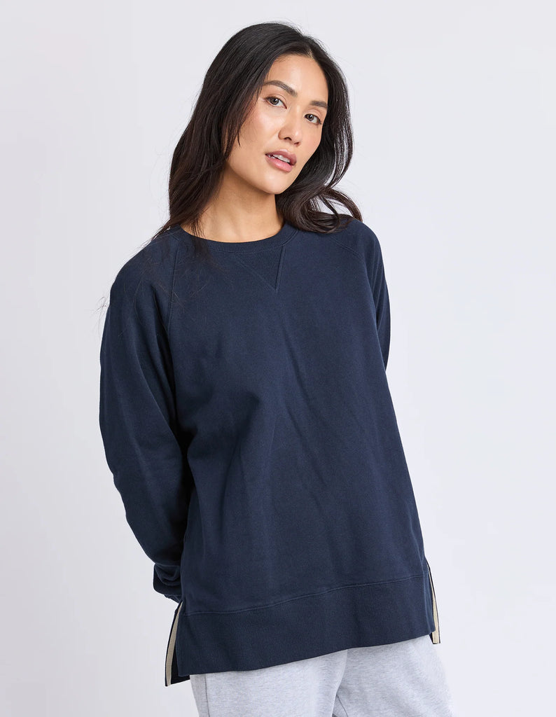 Melbourne crew - navy-Elm-Designed from a classic Elm Crew, the new Melbourne Crew will be your new go-to casual jumper for every day. Featuring a scooped crew neckline, dropped raglan sleeve and splits at the hem, this relaxed-fitting crew is comfortable and stylish. Raglan sleeves Crew neckline Hem splits Unbrushed cotton fleece 100% Cotton Model is wearing a size 10-Pash + Evolve